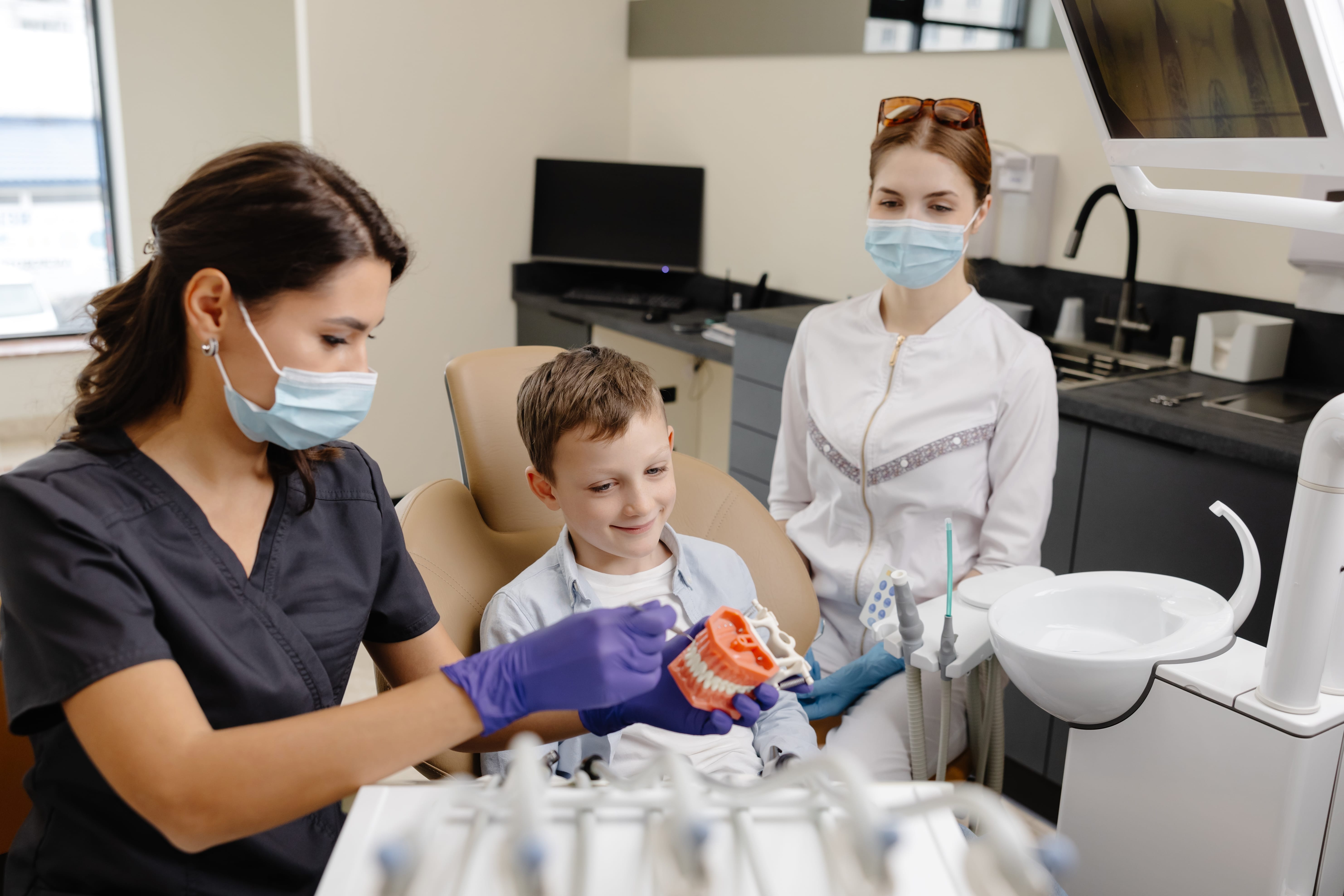 dental care for children nurse talking to little boy